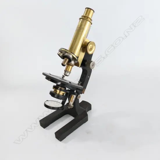 BRASS MICROSCOPE by Dr. F. A WOHLER, CASSEL, w CAST STEEL BASE & LIMB, IN OAK CASE.